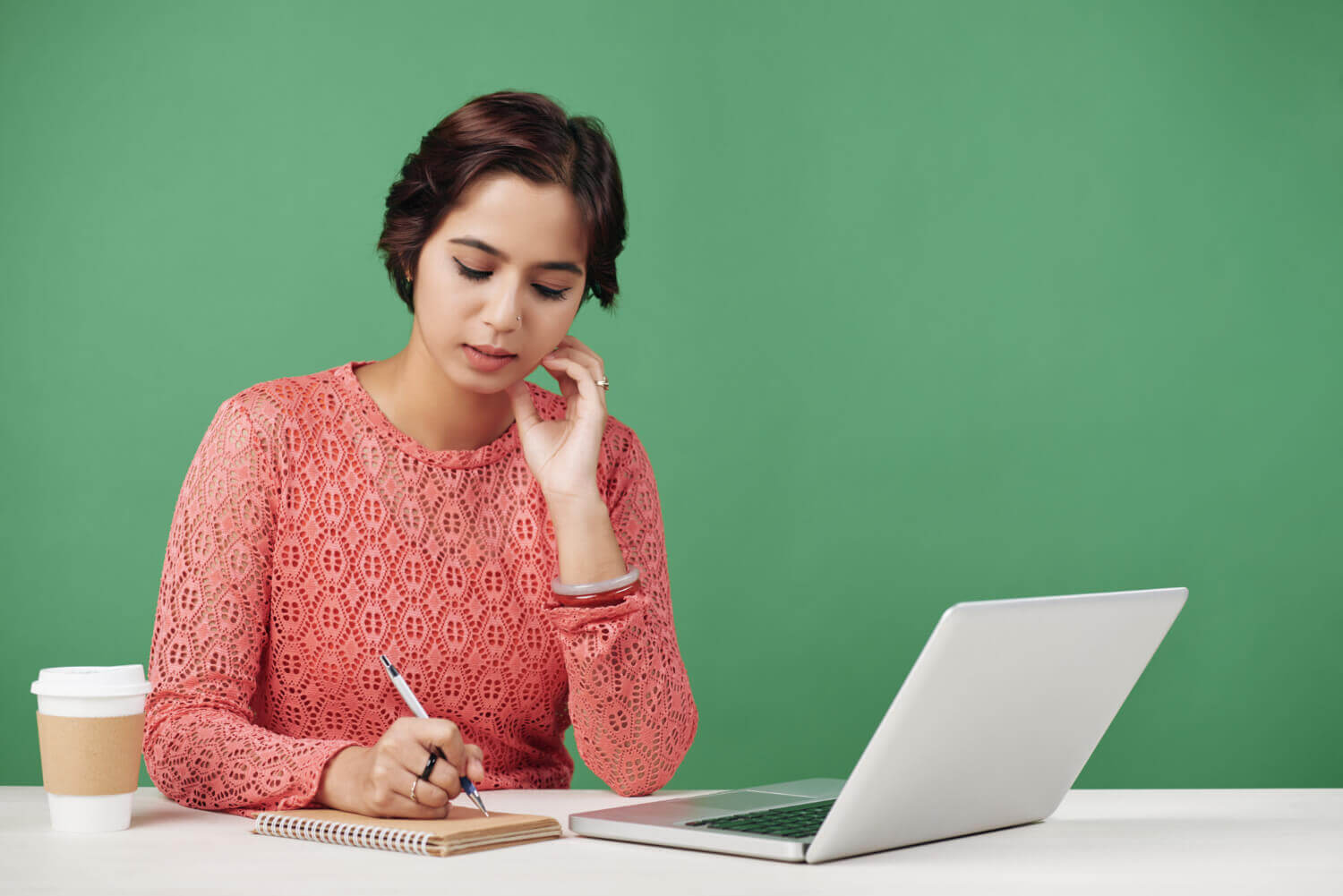 Scholarly woman evaluating changes in the ACT, preparing for shifts in undergraduate admissions criteria - The Red Pen